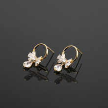Load image into Gallery viewer, Sparkly Bow Stud Earrings E00951